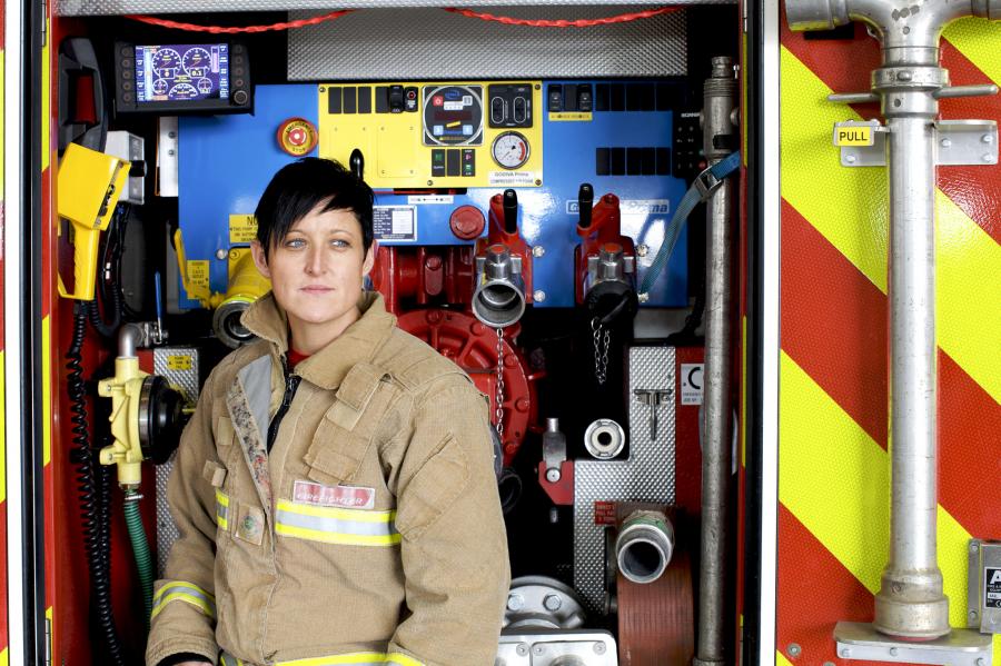 female firefighter fire applicance
