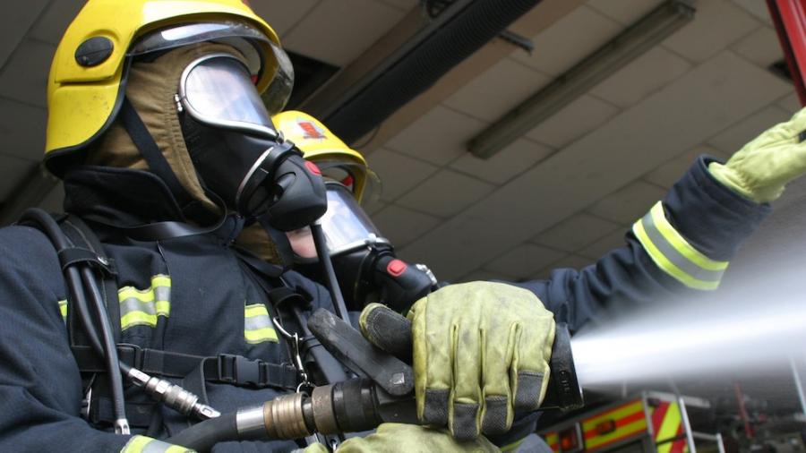 2 two firefighters hose water