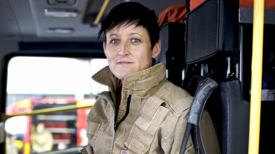 female-firefighter-in-engine