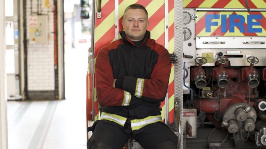 firefighetsr-sitting-on-engine