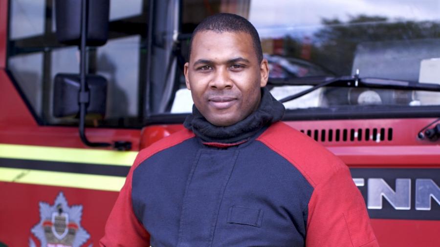 firefighter-in-front-engine