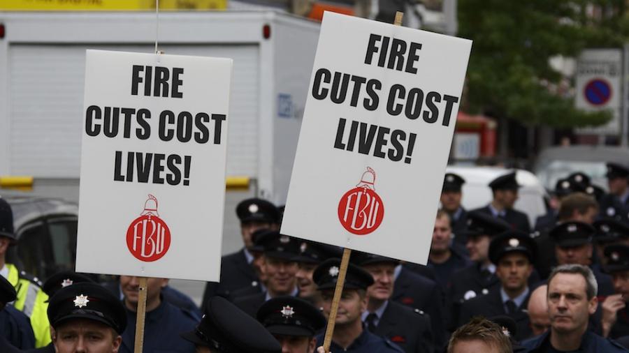 firefighters-holding-cuts-placards
