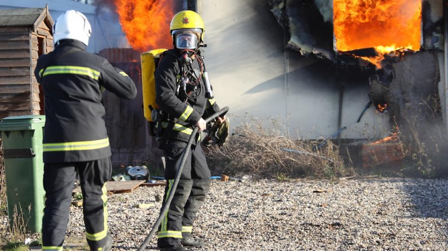 firefighters-mask-building-onfire