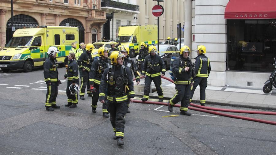 group-firefighters-street-corner