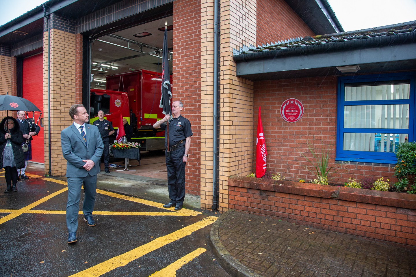 Adrian McGill red plaque being unveiled 