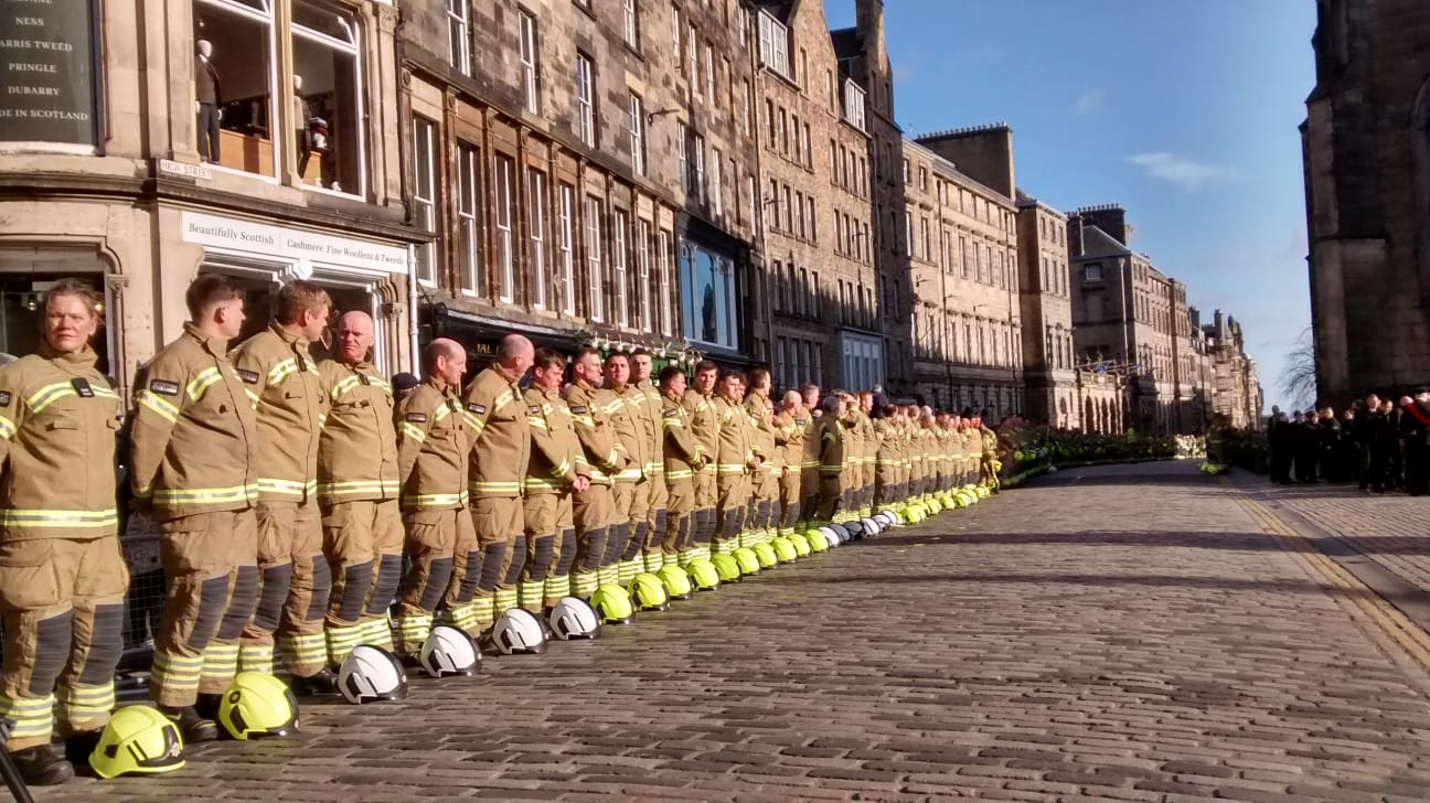 Firefighters line the Royal Mile at Barry Martin's funeral
