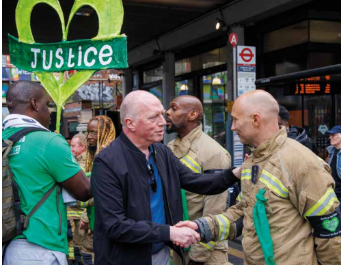 Matt Wrack meets firefighter at Grenfell silent walk