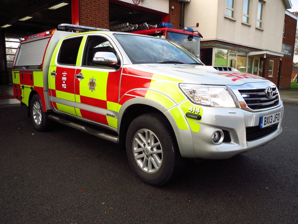 A large car with West Midlands Fire and Rescue Service insignia