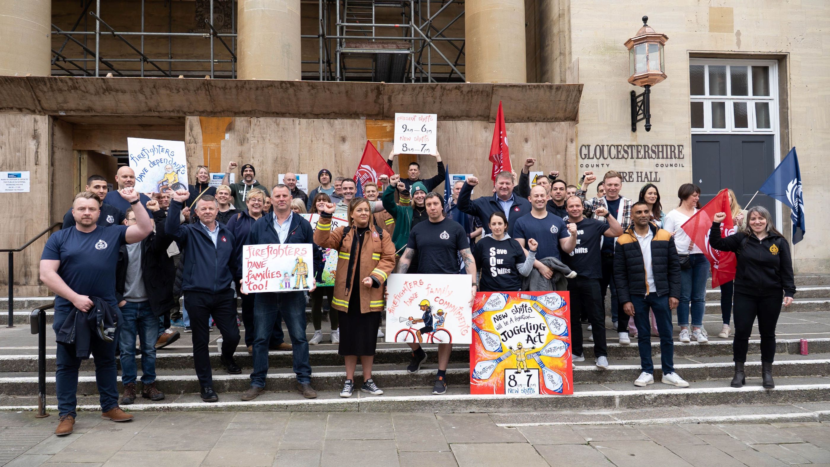 Firefighters rally outside Gloucestershire council with banners against shift pattern changes