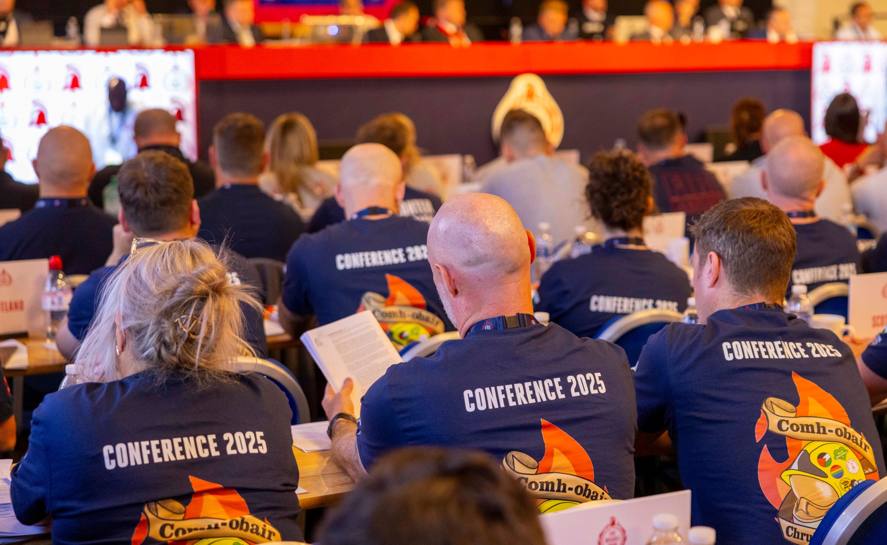 FBU delegates at annual conference wearing t shirts reading '2025 conference'