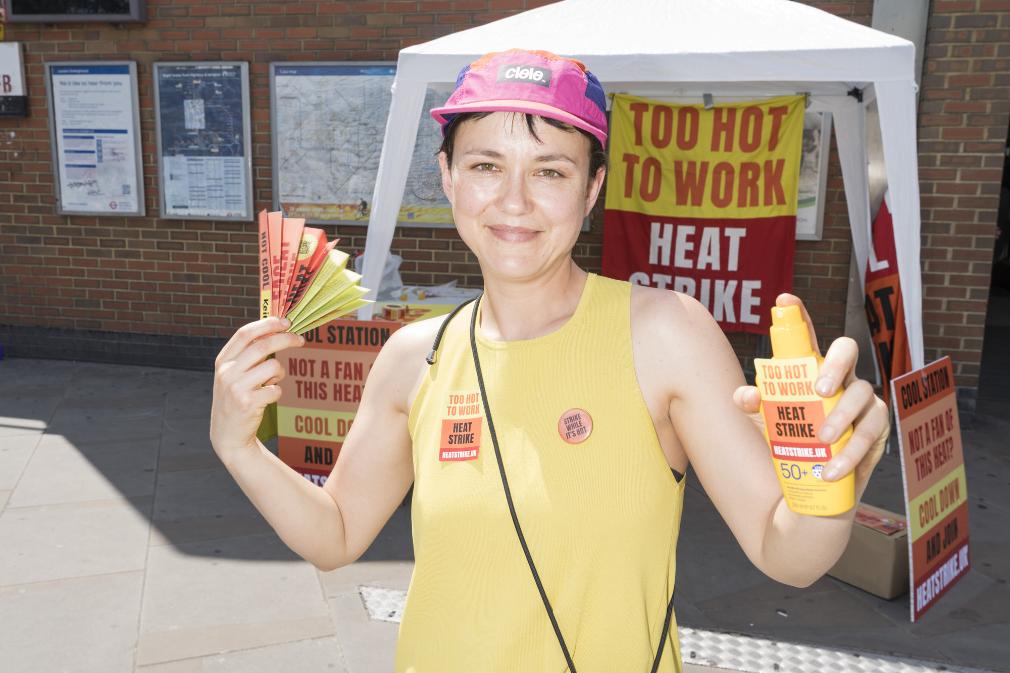 Frieda Lurken poses with heat strike campaign hat and sun cream