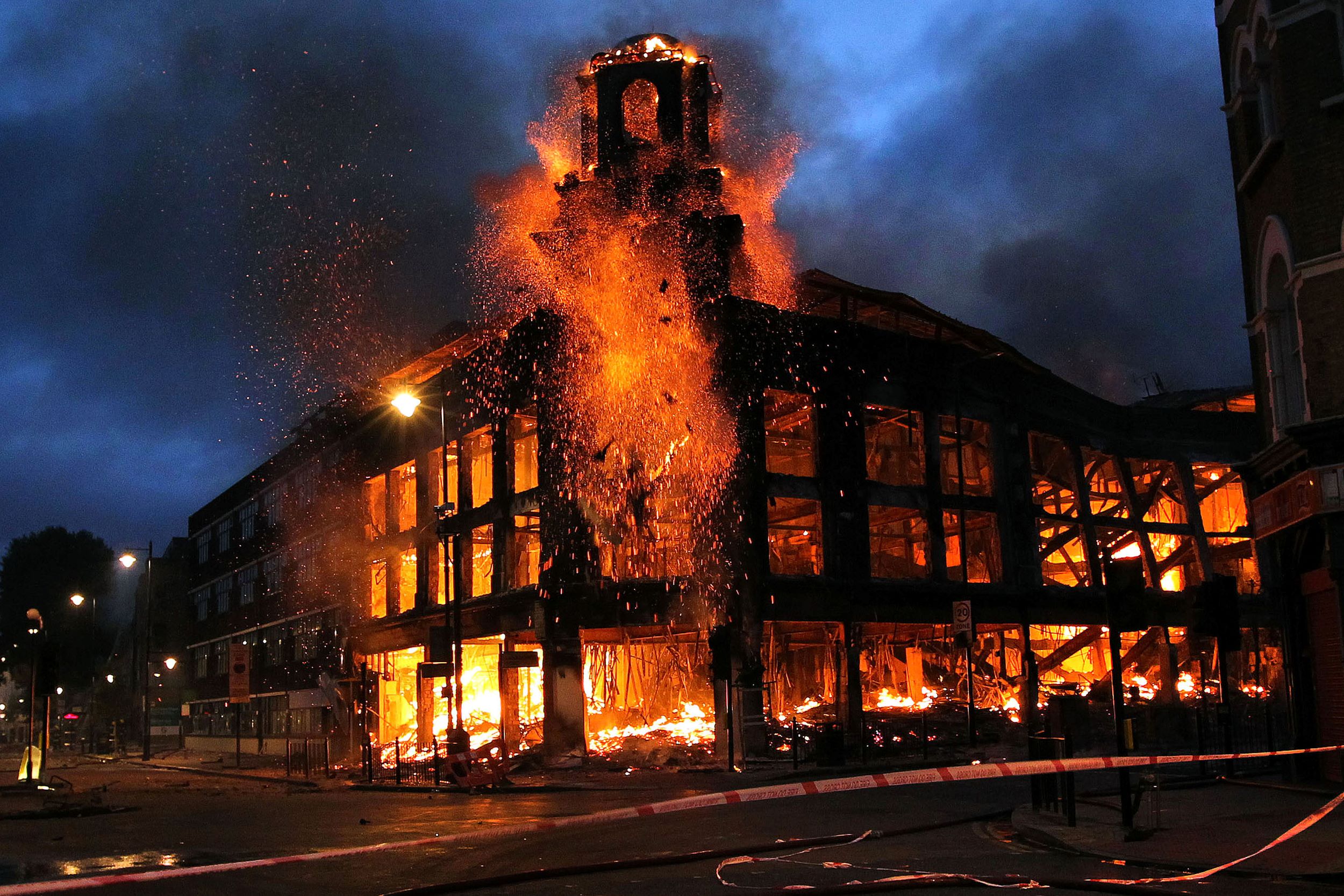 A department store on fire during the London riots