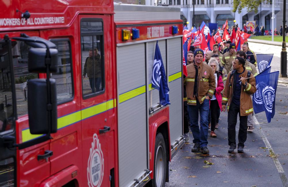 Firefighters with FBU appliance at rally 