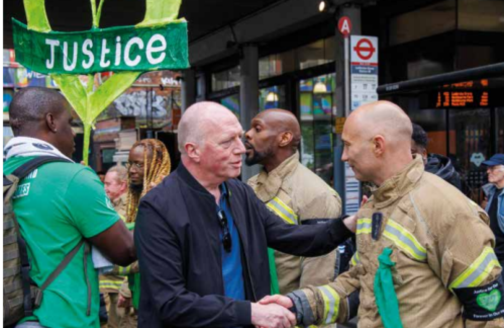 Matt Wrack meets firefighter at Grenfell silent walk