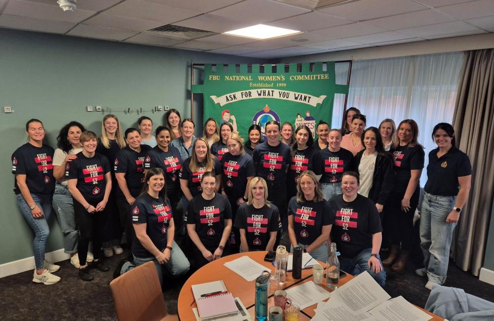 FBU members at the annual national women's committee general meeting wearing Fight for 52 t shirts