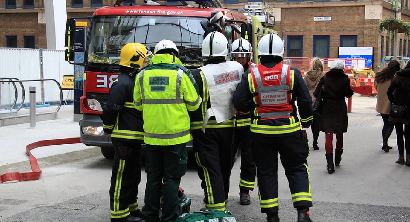 firefighters fire appliance street daylight