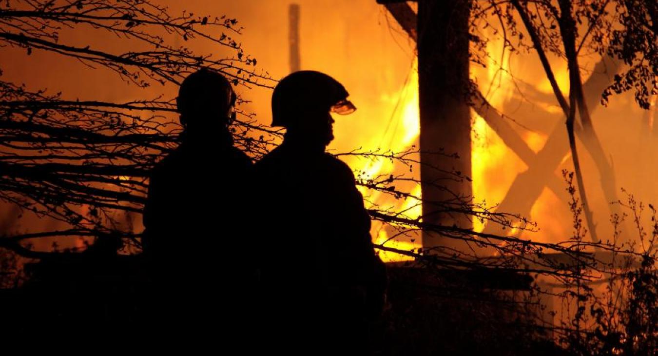silhouette fire firefighters night