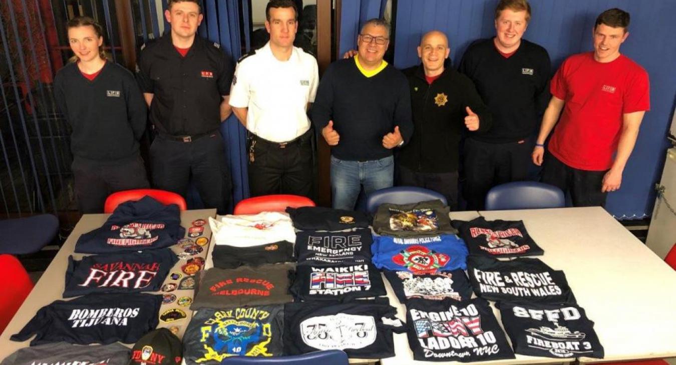 Nicholas Burton David Badillo and red watch colleagues with T-shirt collection lo res