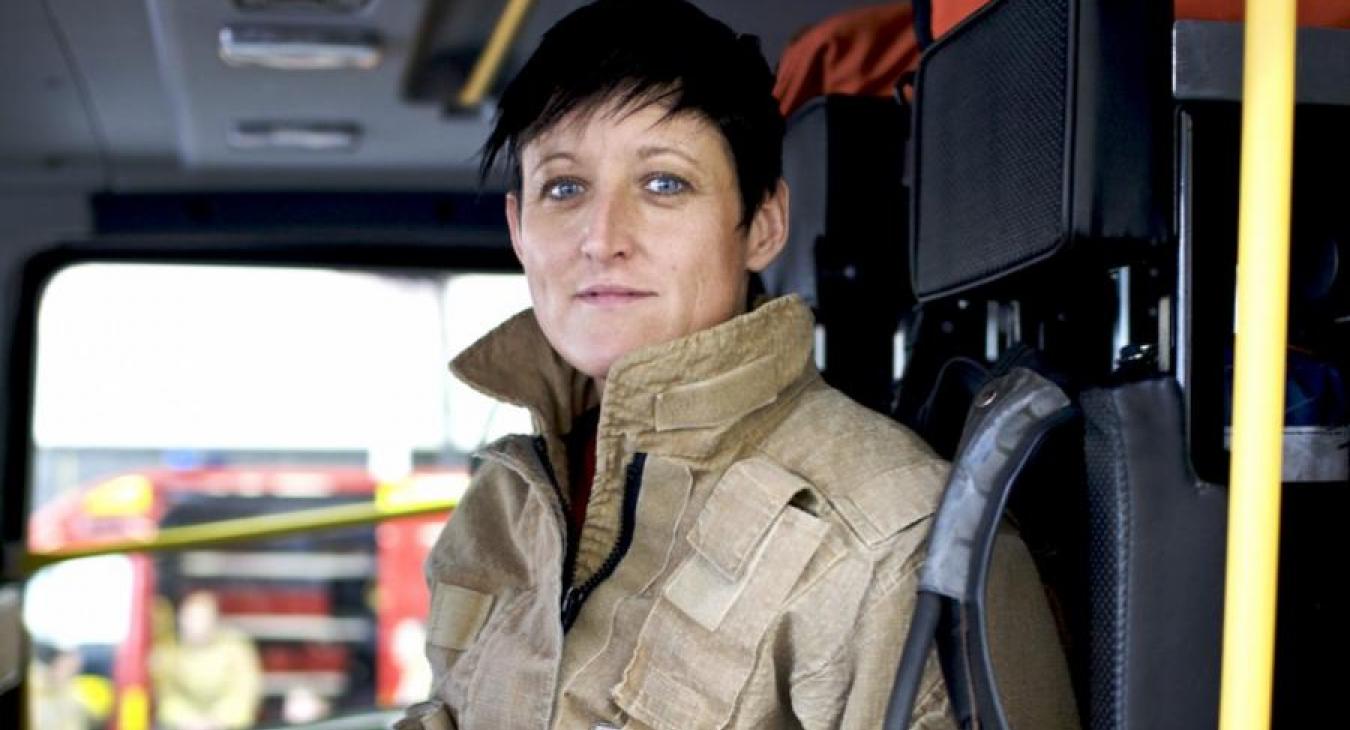 female-firefighter-in-engine
