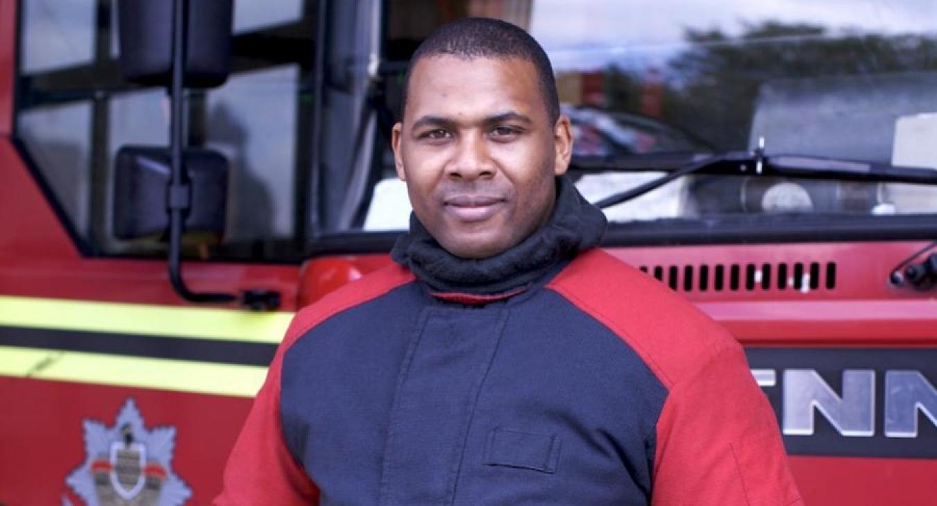 firefighter-in-front-engine