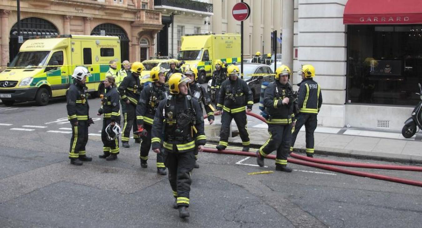 group-firefighters-street-corner