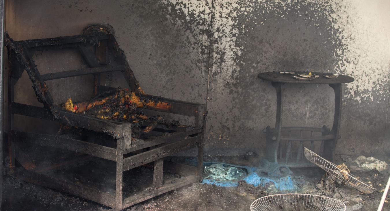 Burnt out armchair