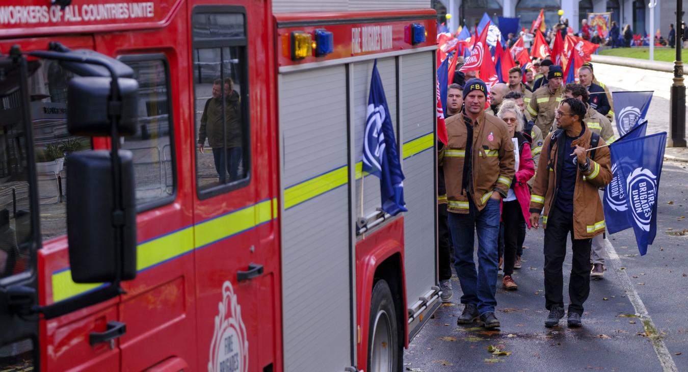 Firefighters with FBU appliance at rally 