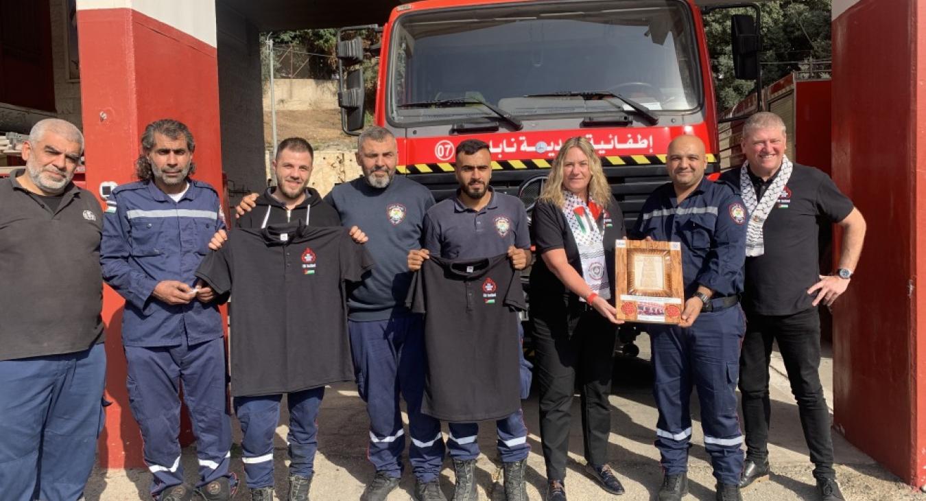 FBU officials and members with Palestinian firefighters