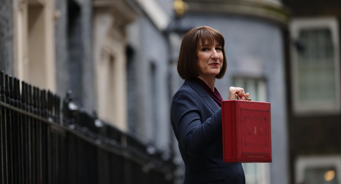 Rachel Reeves holding red budget briefcase outside downing street