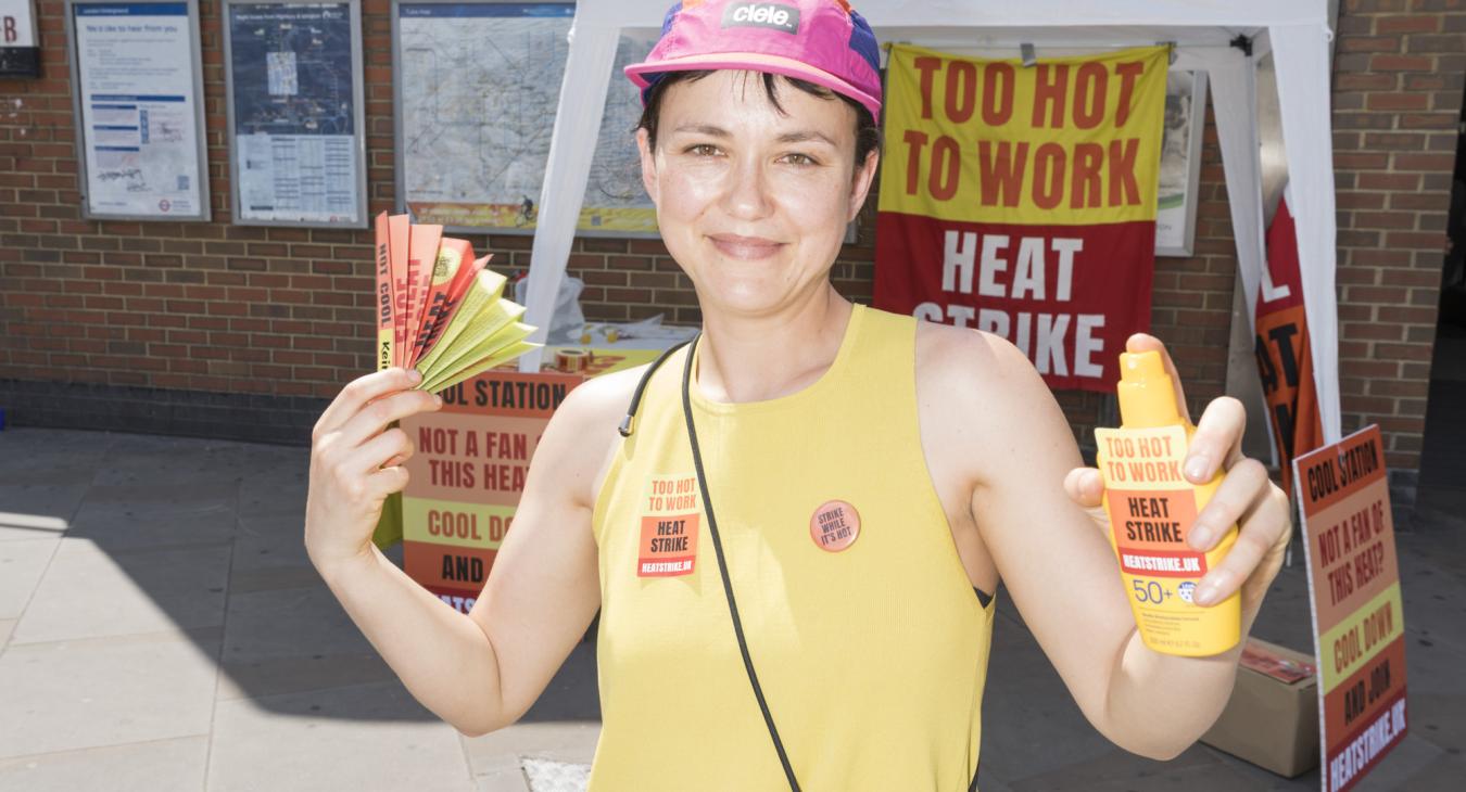 Frieda Lurken poses with heat strike campaign hat and sun cream