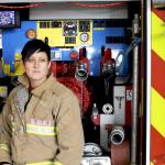 female firefighter fire applicance