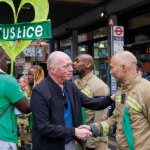 Matt Wrack meets firefighter at Grenfell silent walk