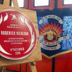 Red plaque next to FBU banner