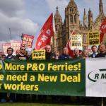 RMT members outside parliament with a banner saying: No more P&O ferries! We need a new deal for workers"