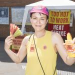 Frieda Lurken poses with heat strike campaign hat and sun cream