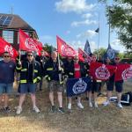 FBU members rally with flags outside fire authority meeting