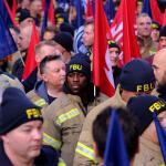 Portrait in crowd of firefighters attending firefighters manifesto rally