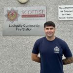 Jamie McDonald smiles outside Lochgelly fire station